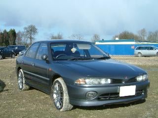 Graphite Mitsubishi Galant VR-4 sedan, front three-quarter view