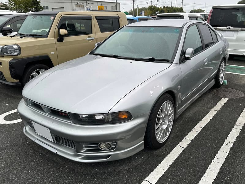 Silver eighth-generation Mitsubishi Galant VR-4 (E-EC5A) sedan, front three-quarter view