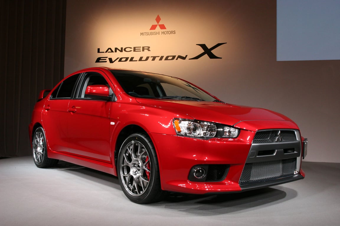 Red Mitsubishi Lancer Evolution X, front view, Tokyo, 1 October 2007