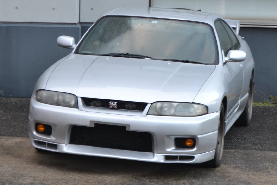 Nissan Skyline R33 GT-R coupe on aftermarket wheels