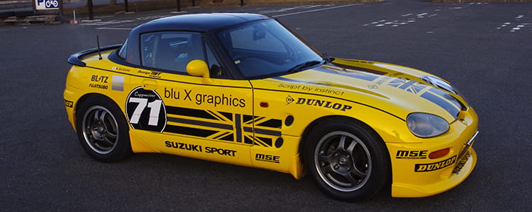 Suzuki Cappuccino EA11R front three-quarter, top off