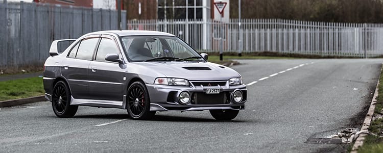 Mitsubishi Lancer Evo — hero image, three-quarter view