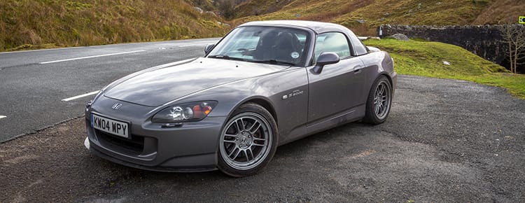 Honda S2000 in red, front three-quarter view