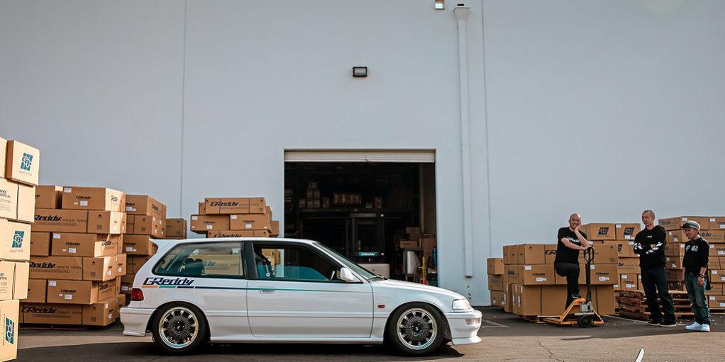 Honda Civic in white, side three-quarter view