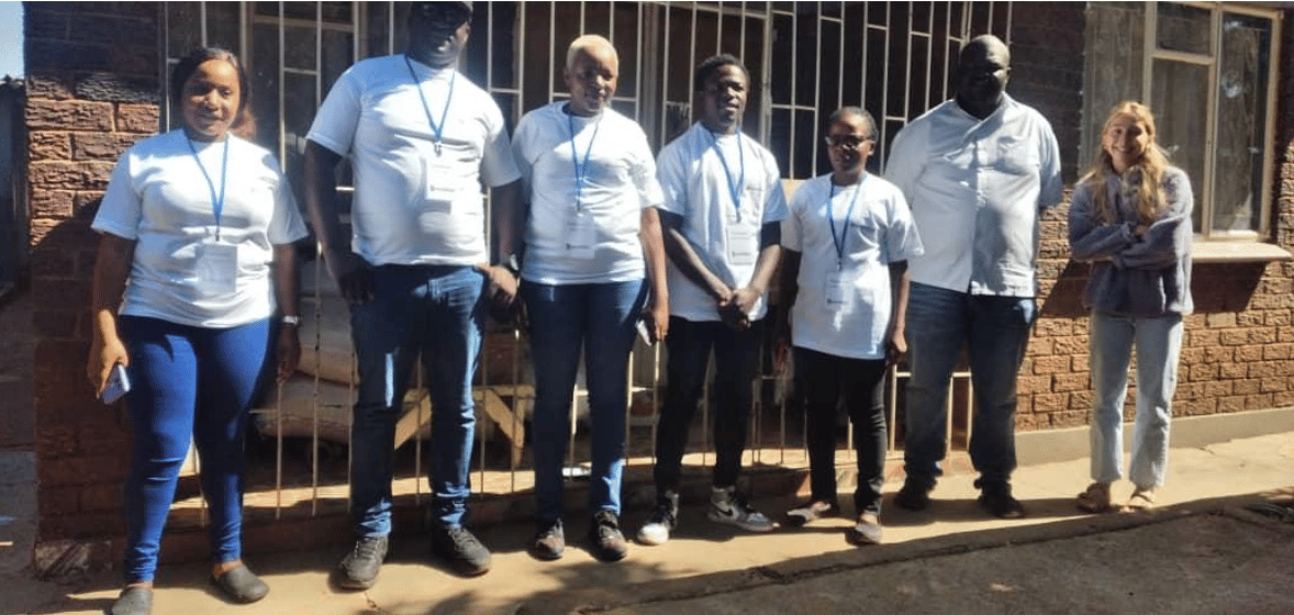 3. Photos_ Enumerators being briefed on randomization during data collection and research ethics.