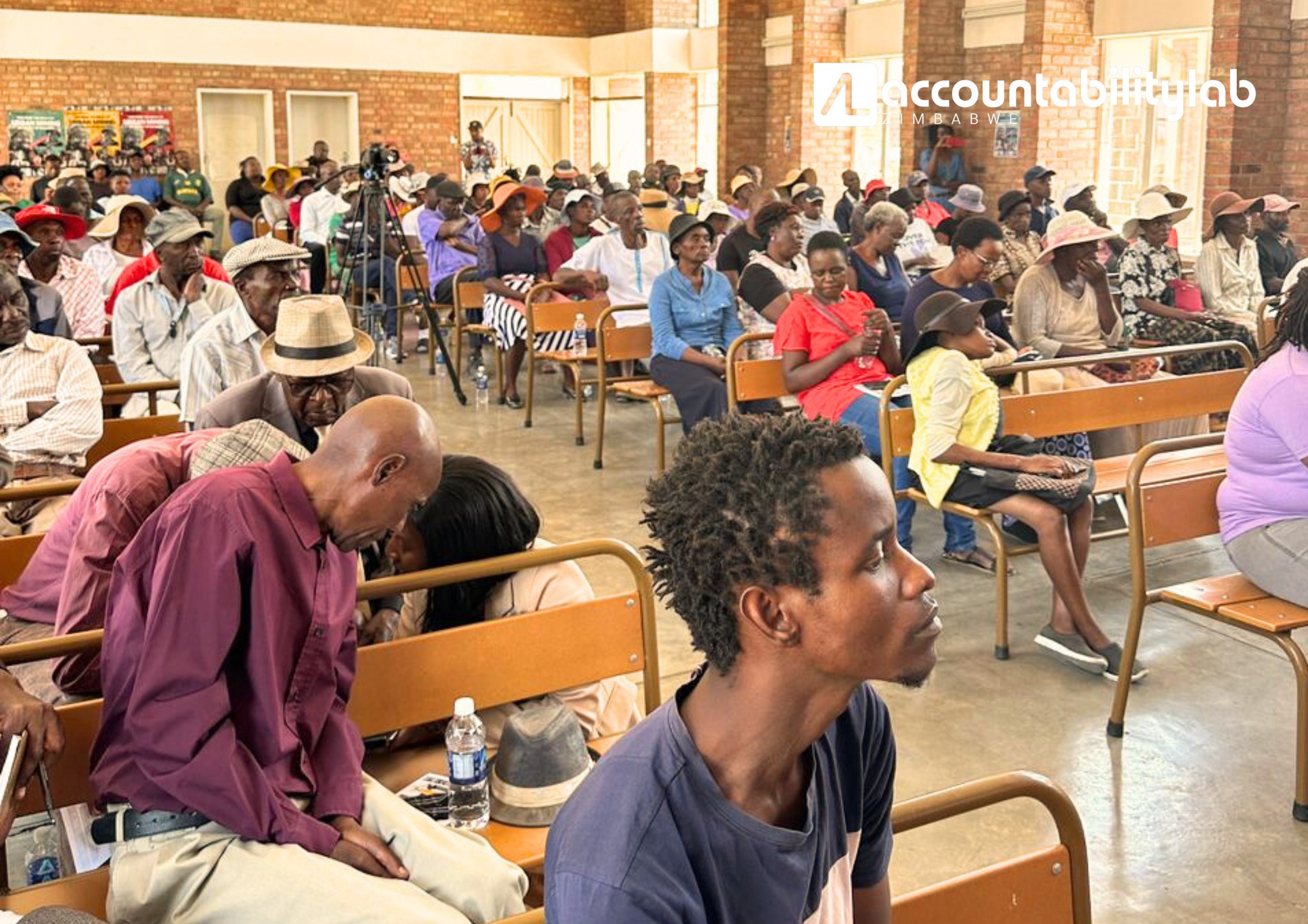 2. Images of duty bearers and Pumula residents watching Time Bomb, followed by a collaborative discussion on co-creating sustainable solutions to the challenges of urban mining