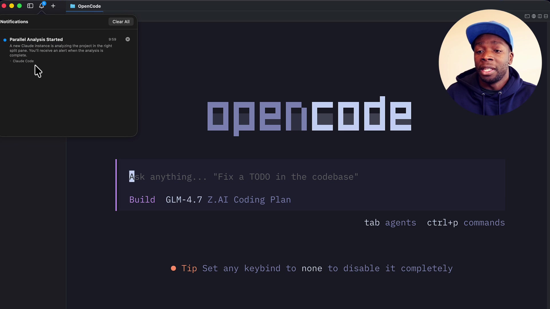 A macOS notification appears at the top right of the screen, originating from `cmux`.