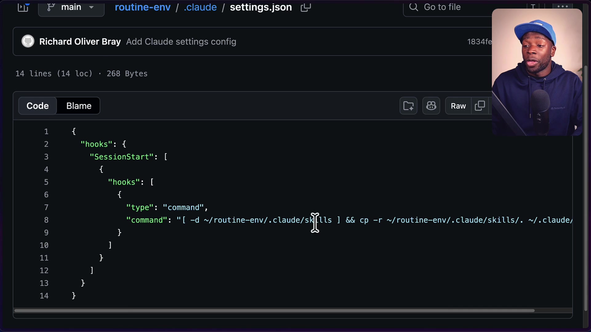 Content of the settings.json file showing the SessionStart hook and the cp command used to copy the skills