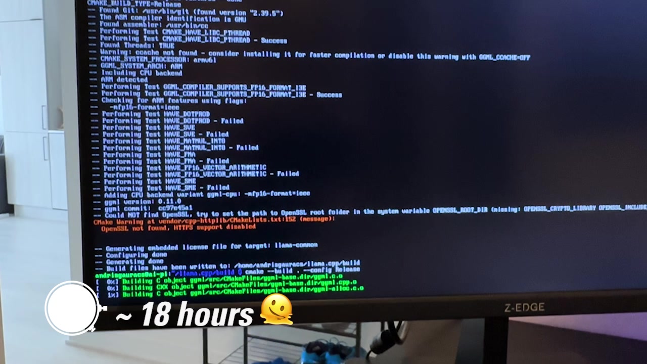 Terminal on the Raspberry Pi showing the cmake build process starting slowly with an 18-hour estimate