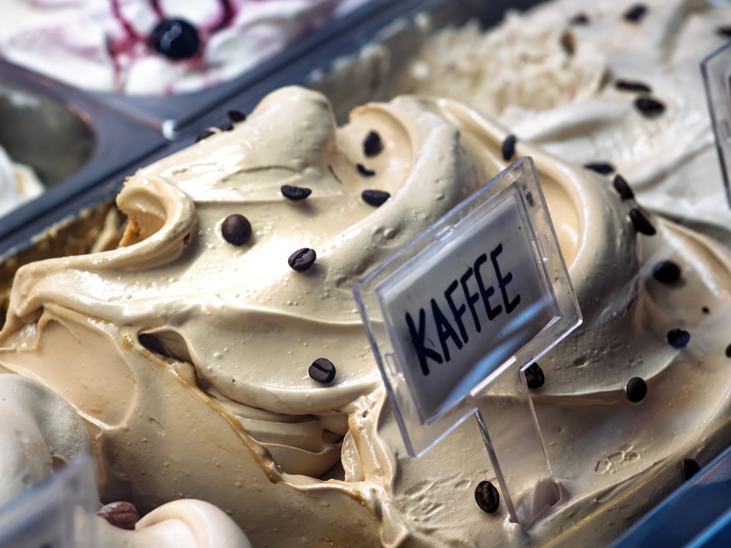 Delicious Italian Gelato Display Featuring Coffee Flavor