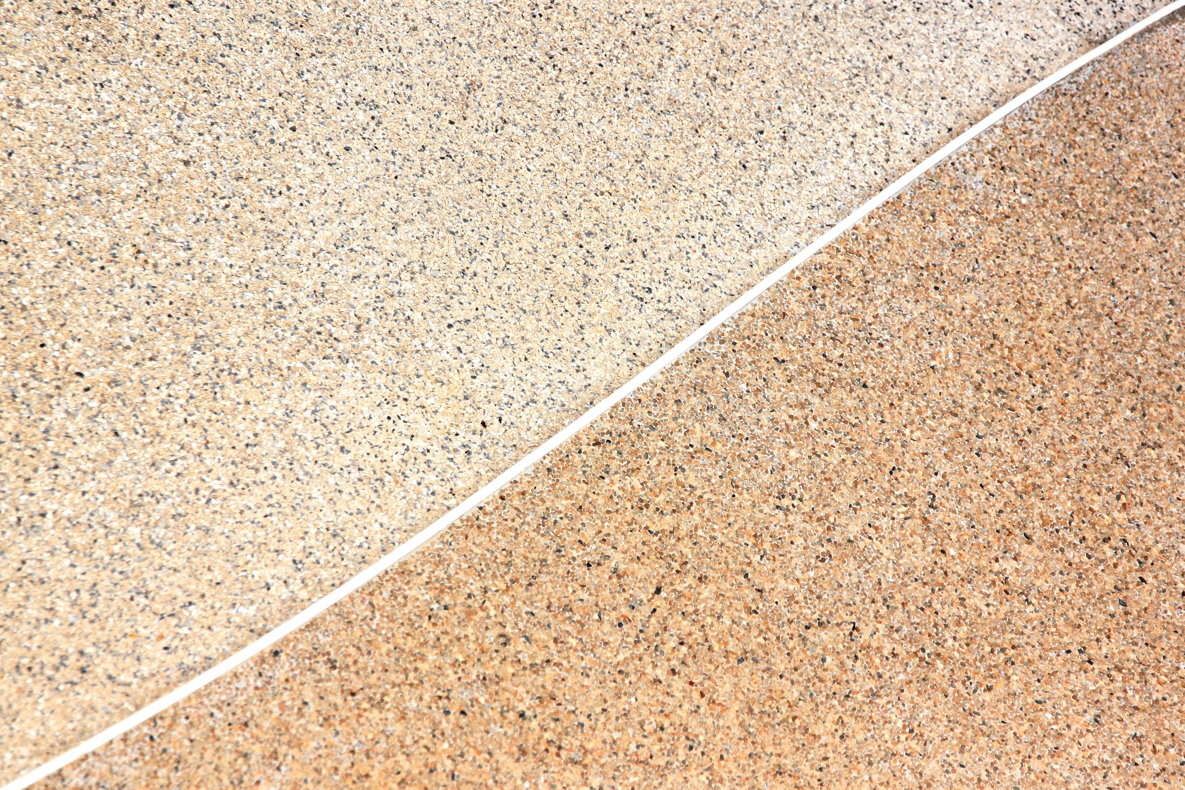 Two stone color with a white stripe separating them of background.