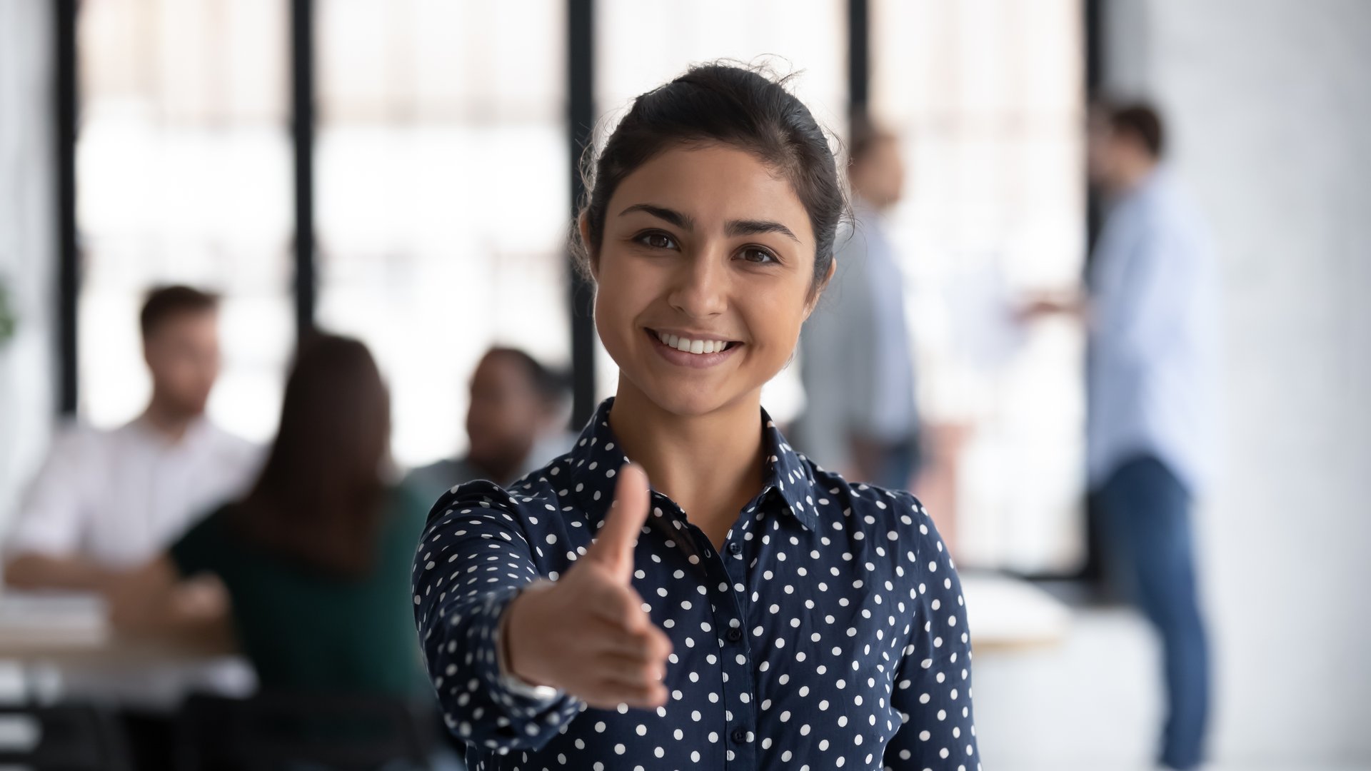 Head shot of friendly indian boss greeting client stretch out hand welcoming express amity good manners meet job vacancy applicant, first acquaintance, human resource HR manager recruiter work concept