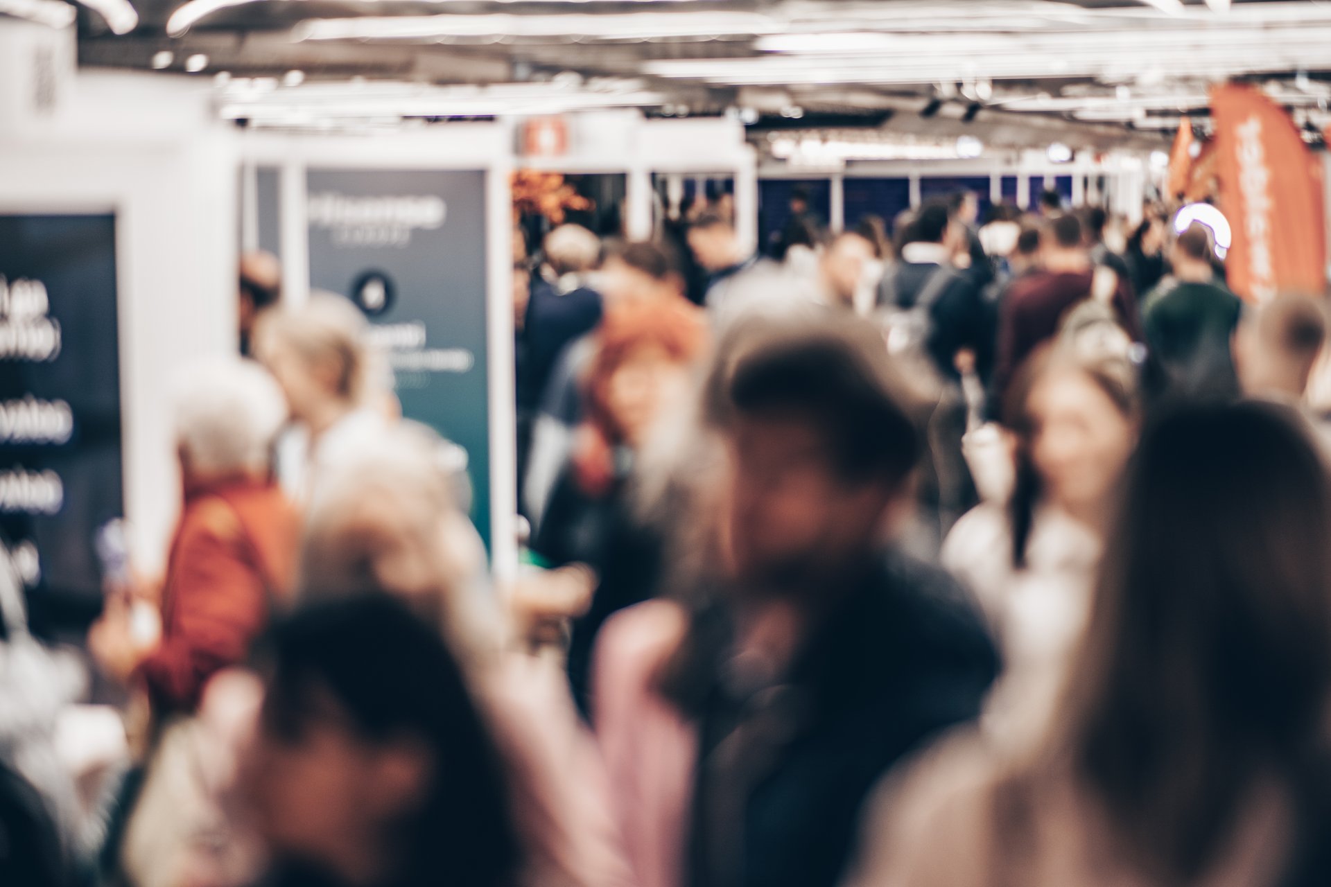 Abstract blurred people at exhibition hall of expo event trade show. Business convention show or job fair. Business concept background