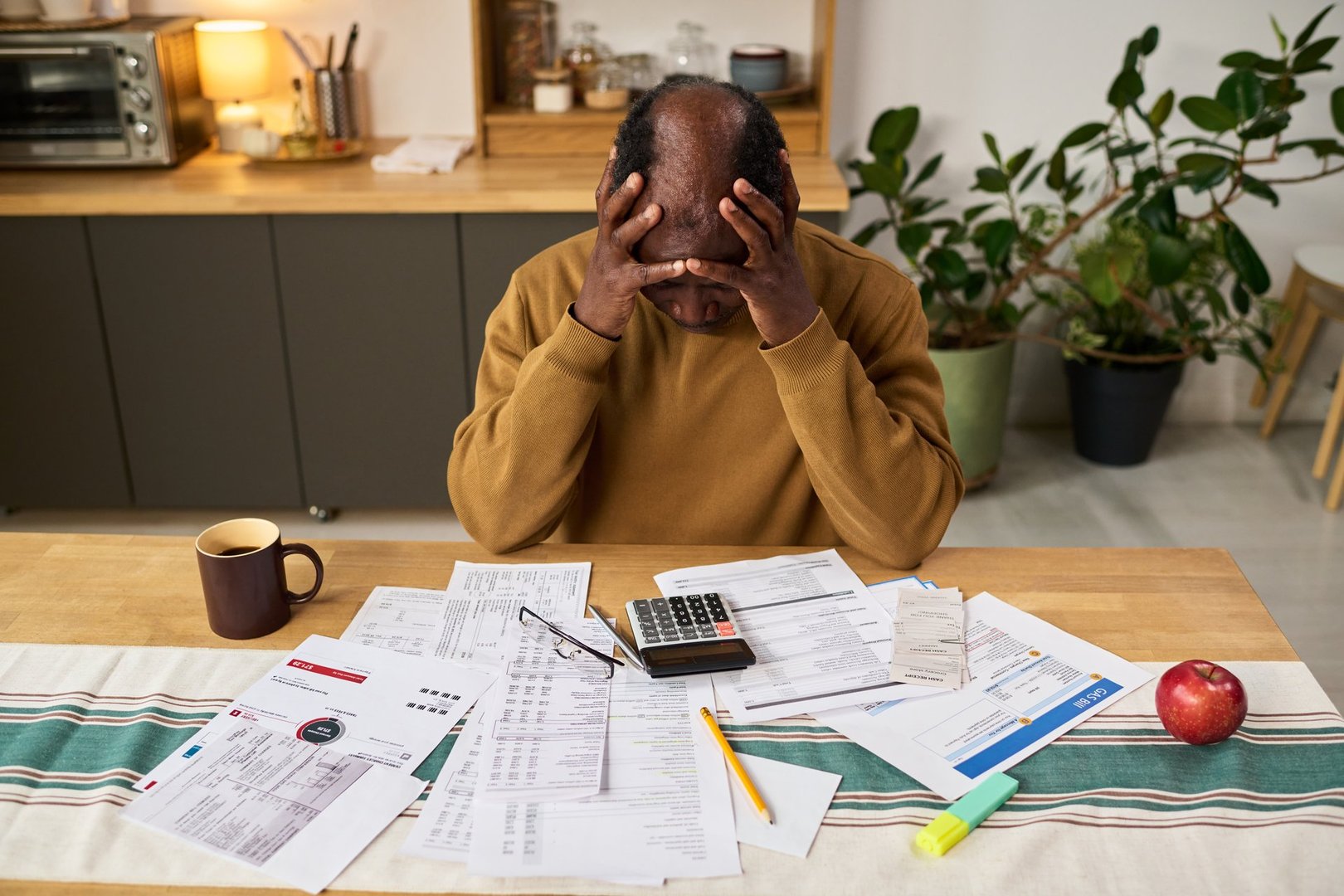 Stressed homeowner with documents