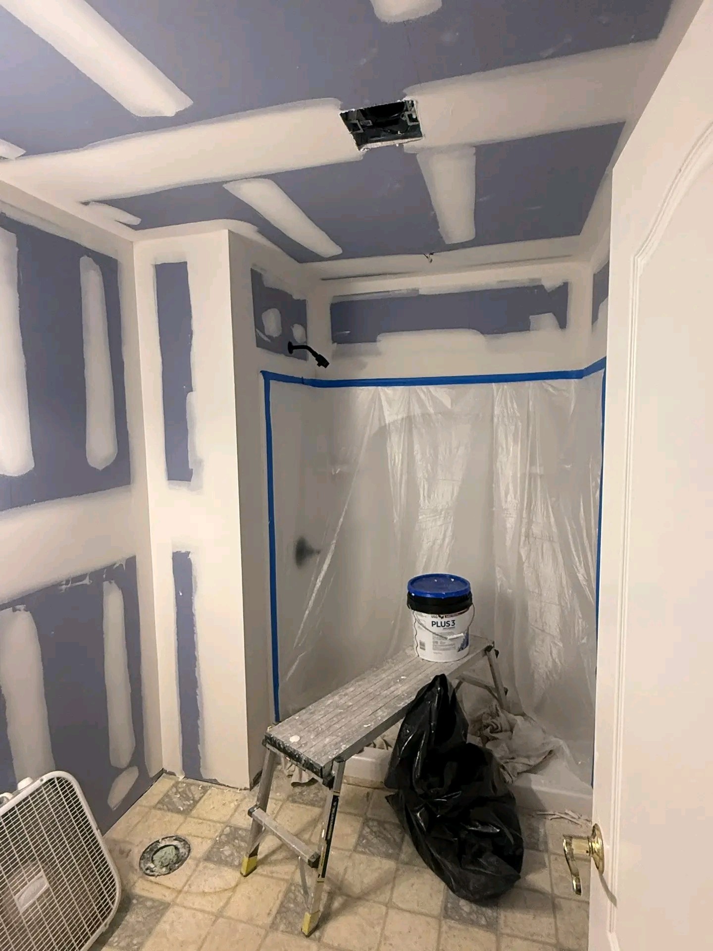 Greenboard drywall installation in bathroom