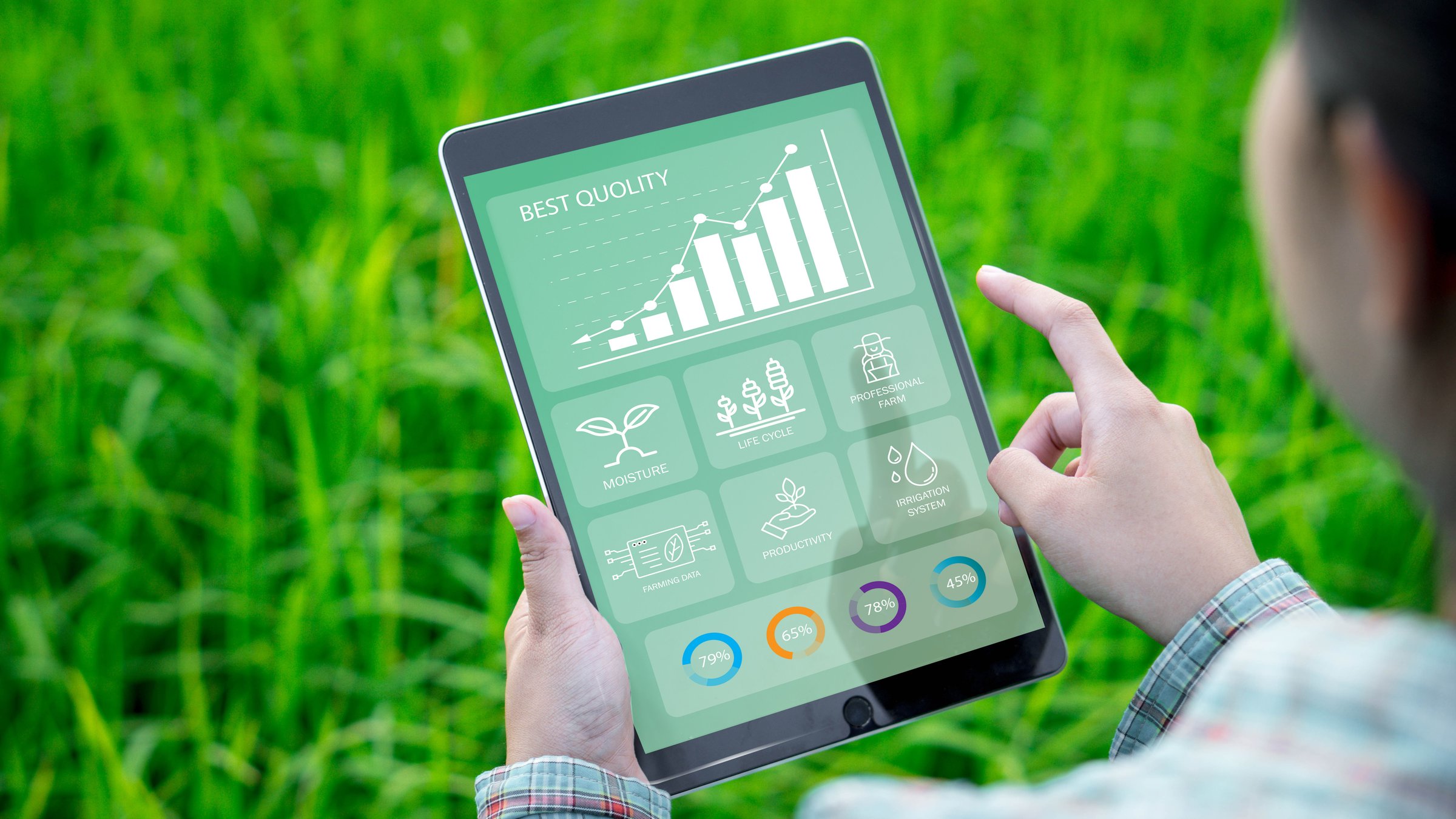 Farmers use agricultural technology in data analysis tablets and image icons. New technologies in agricultural business concepts. Men use tablets to research and develop plant varieties, agricultural