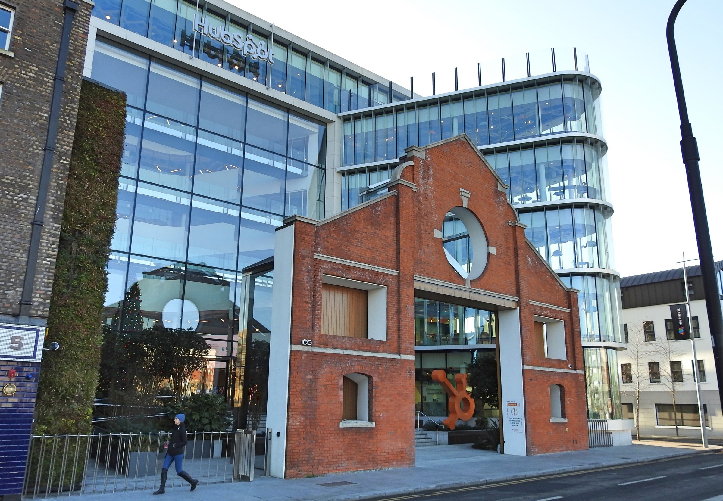 10th December 2021, Dublin, Ireland. Selective focus on the Hubspot House signage outside the Hubspot European headquarters offices in Sir John Rogerson's Quay on Dublin's South Docks.