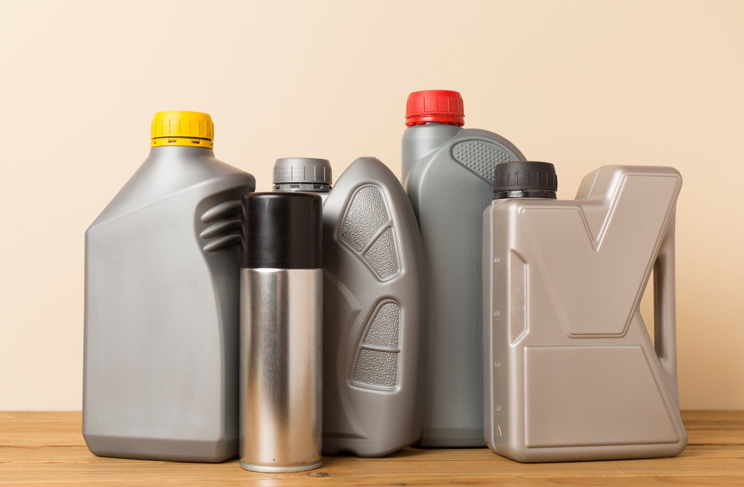 Different automobile products on wooden background