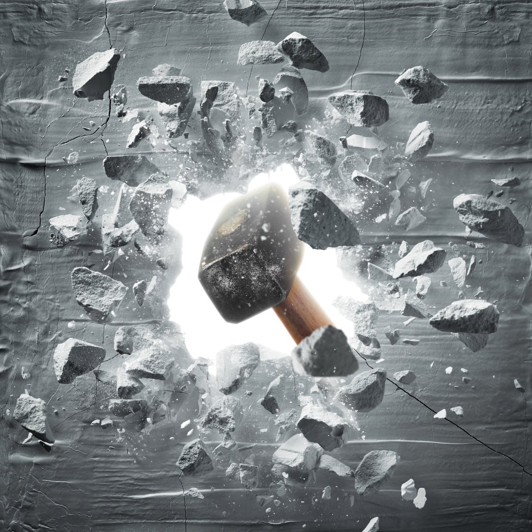 Hammer hitting wall