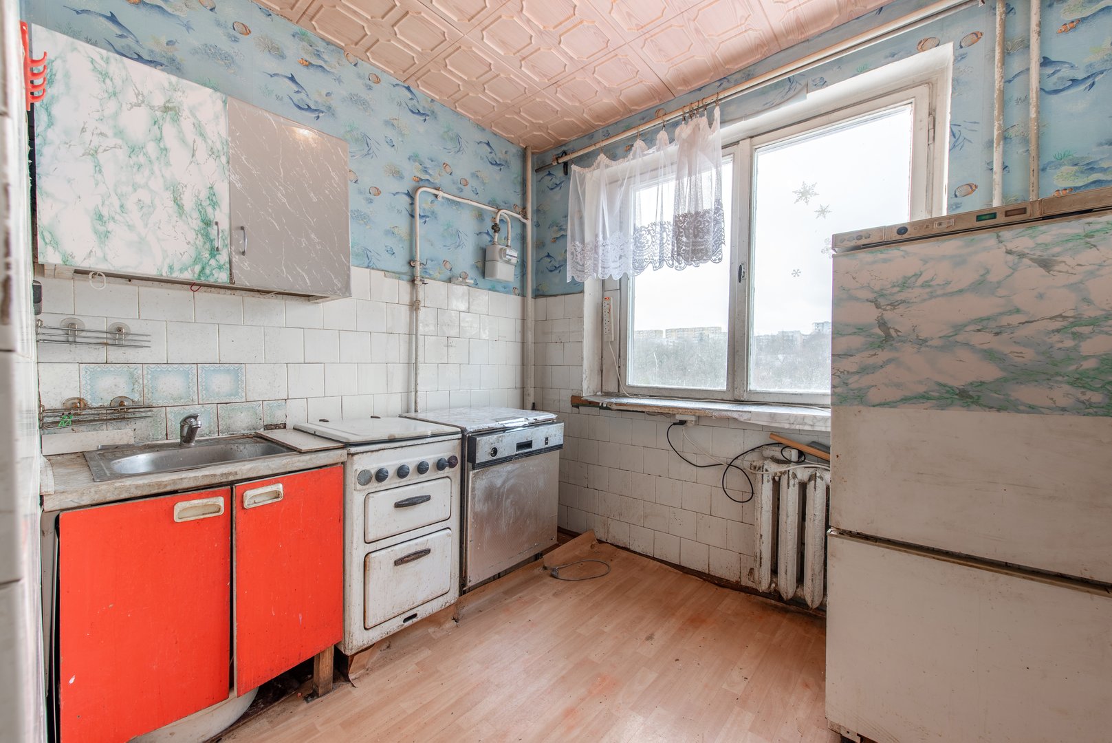 Kitchen in bad condition in an abandoned building. Abandoned house interior. Dirty Room. Old Soviet Russian Poor Interior. Wide Angle
