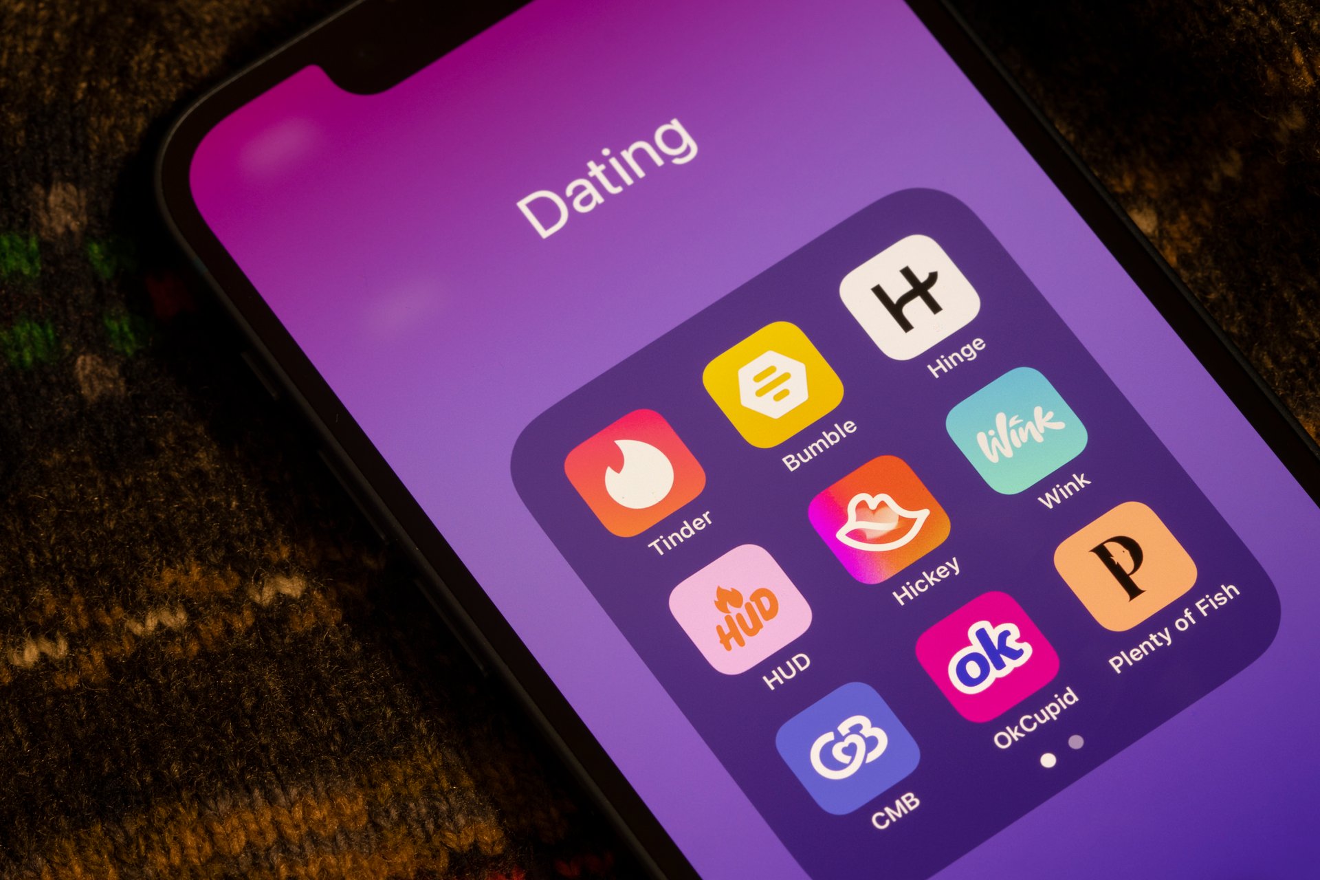 Redmond, WA, USA - Jan 13, 2024: Assorted dating apps, including Tinder, Bumble, Hinge, HUD, Hickey, Wink, Coffee Meets Bagel (CMB), OkCupid, and Plenty of Fish (POF), are seen on an iPhone.