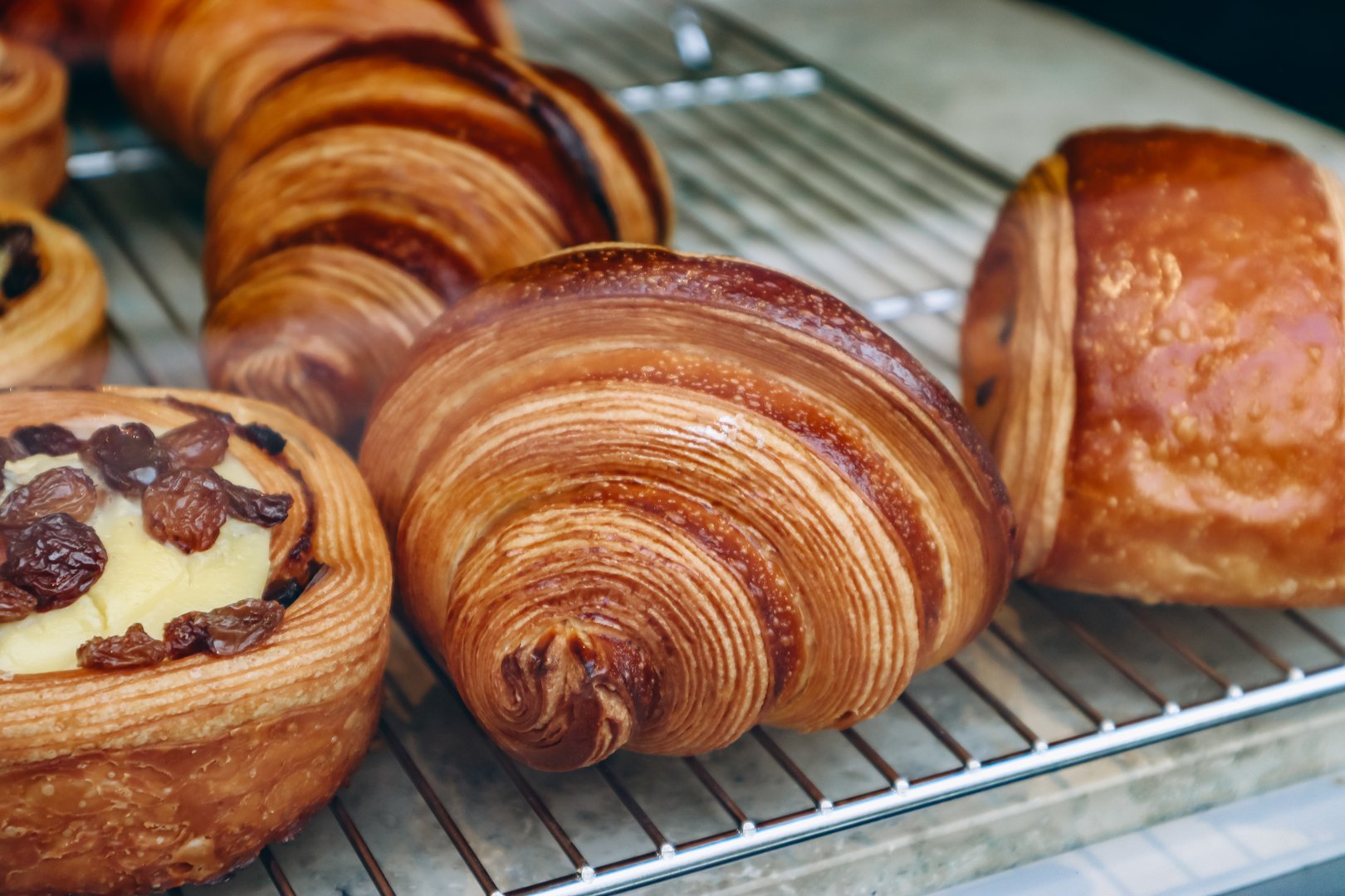 Close-up of fresh and beautiful french pastries in a bakery showcase