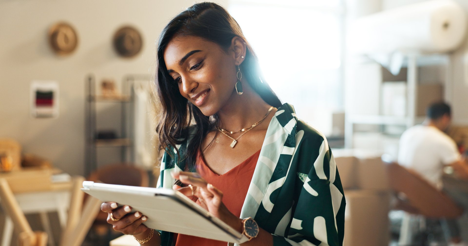 Businesswoman, tablet and smile for startup, business and social media marketing. Creative, technology and website for design company, work and new workplace for research, manager and strategy plan