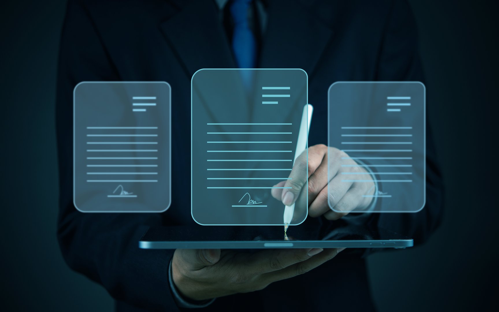 businessman signing a digital document on a tablet with holographic contract icons