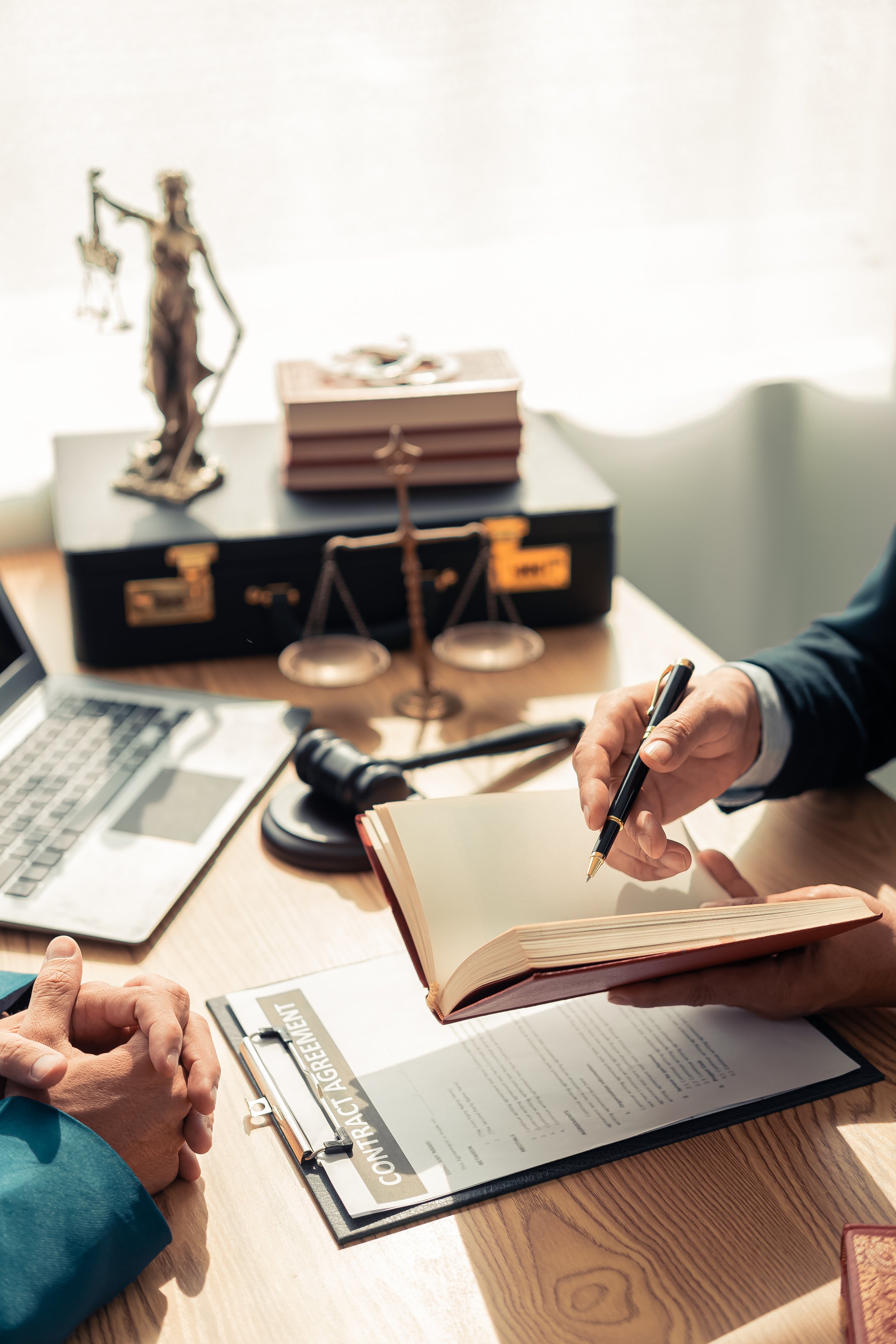 Concept of justice and law Legal courtroom Lawyers discuss contracts or business agreements at a law firm: