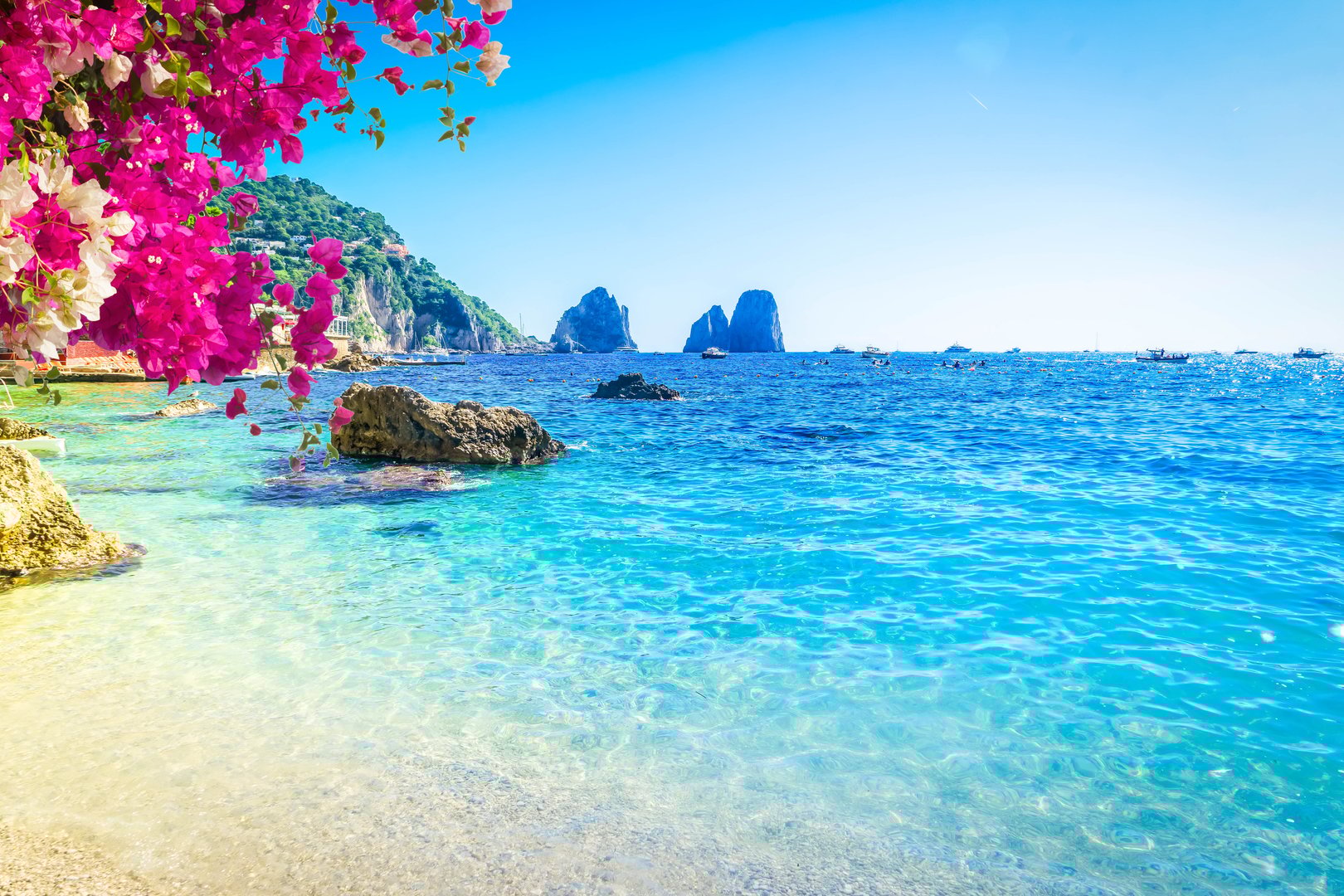 Marina Piccola summer beach with flowers, Capri island, Italy