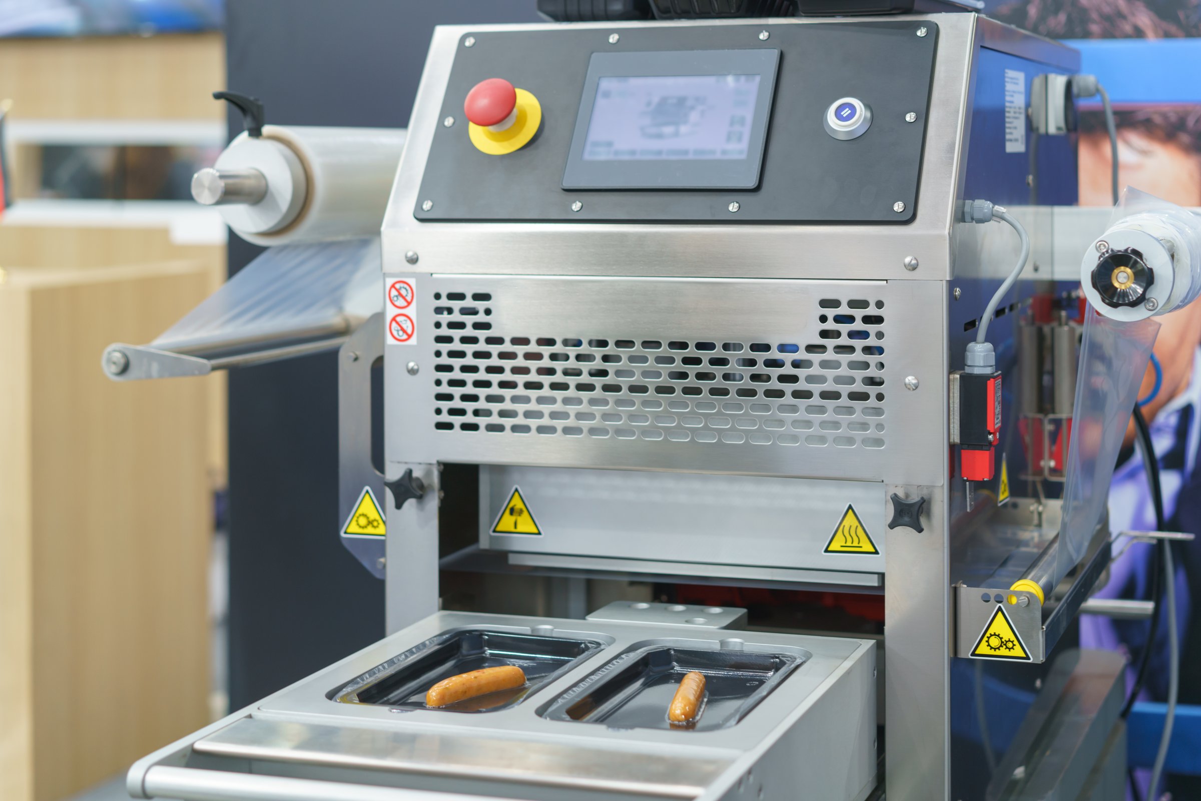 Automated food packaging machine, specifically designed for efficiently sealing and packaging food products such as sausages