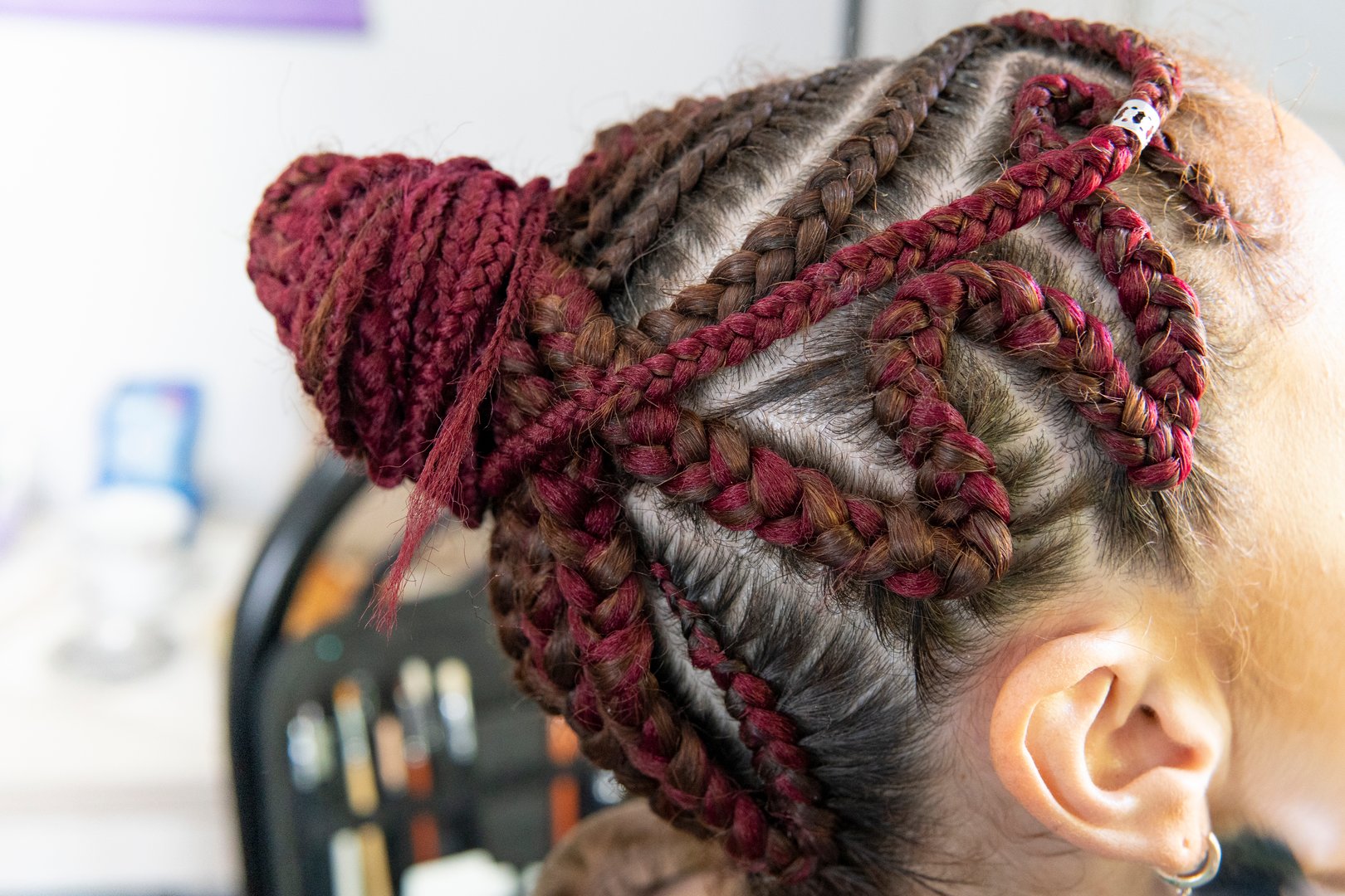 Beautiful braided updo with intricate cornrow patterns
