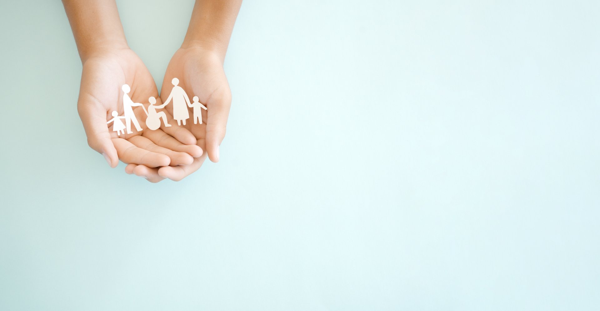 Hands holding diversity family, happy caregiver and volunteer, disable nursing home, rehabilitation and health insurance concept