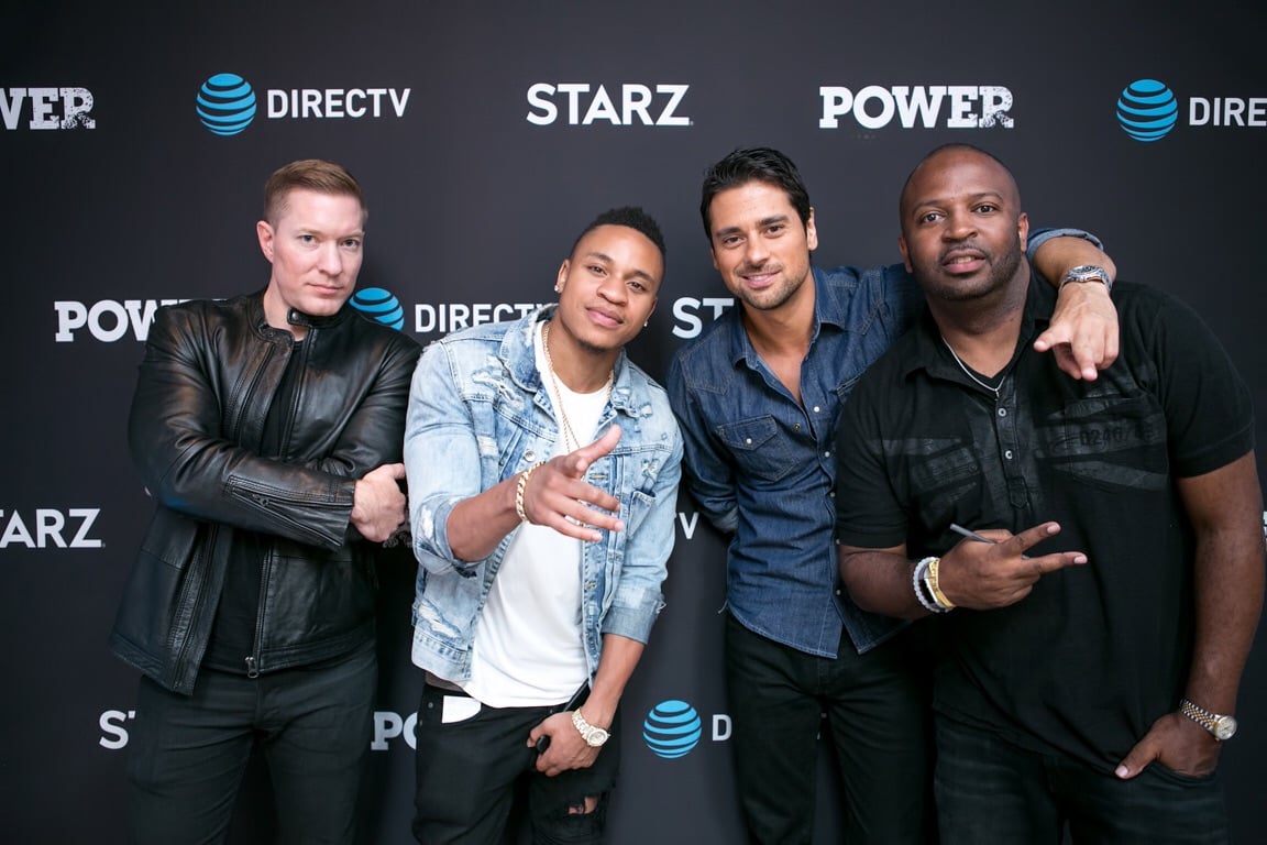 Diverse team of marketing professionals working together on a project in a modern office, analyzing charts and graphs on a large table