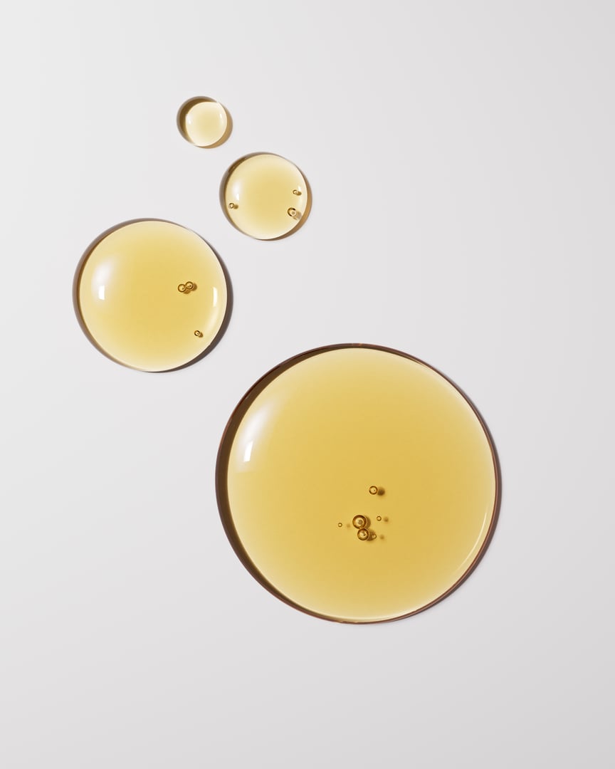 Argan oil liquid texture minimalist background 3d rendering, yellow serum drops on white, natural cosmetic concept.