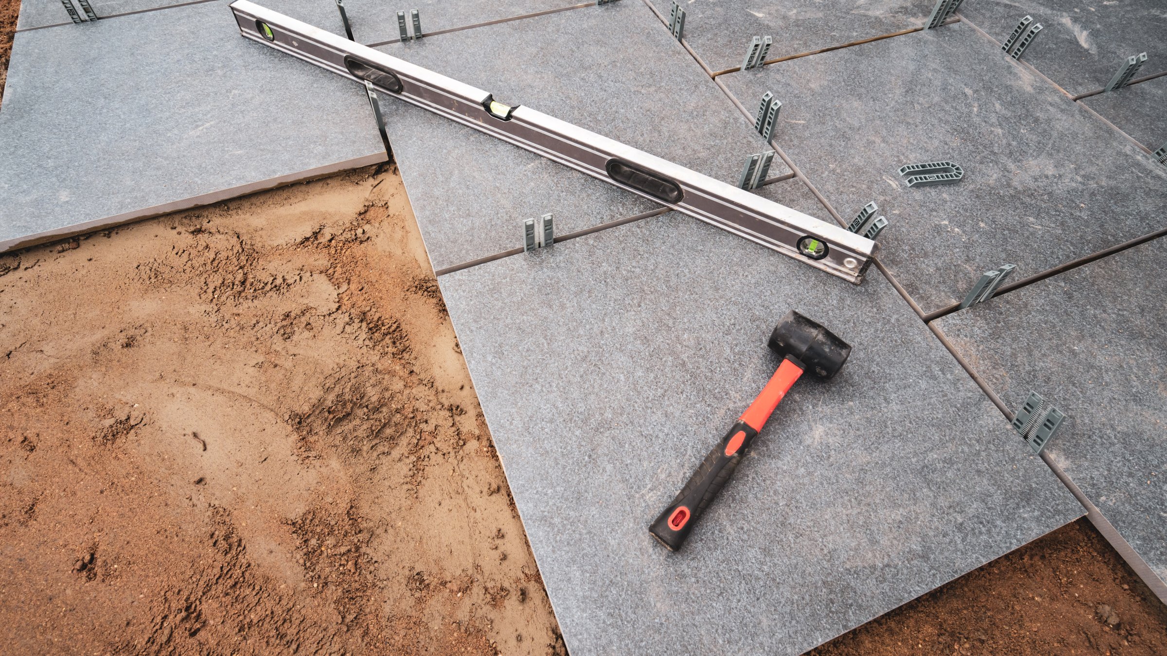 Professional patio installation - tools and craftsmanship