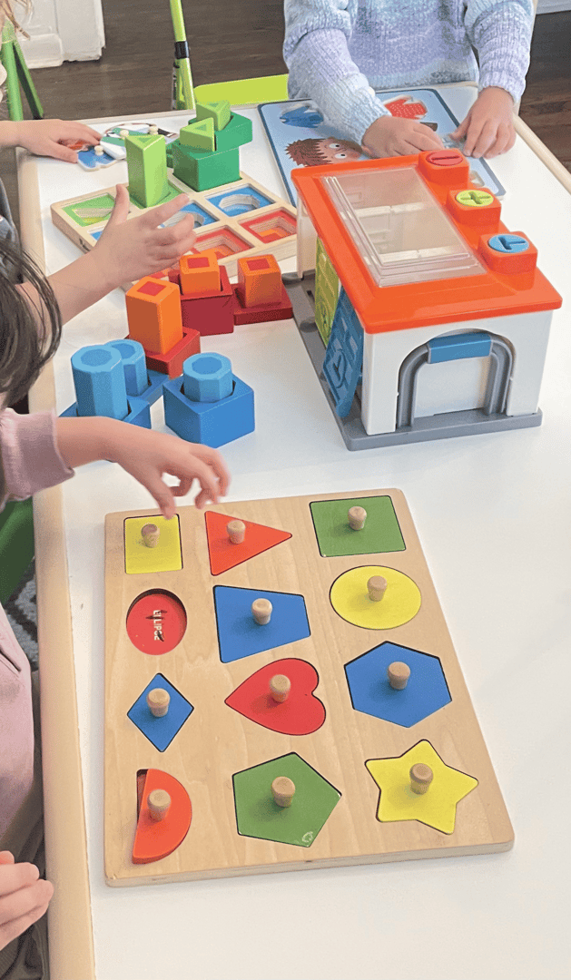 Child playing with educational toys