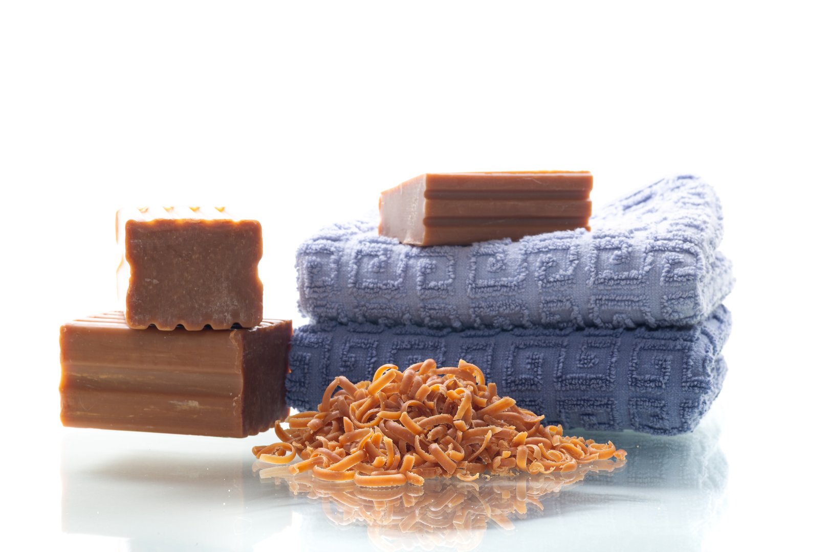 Traditional household soap and grated detergent for surface cleaning.