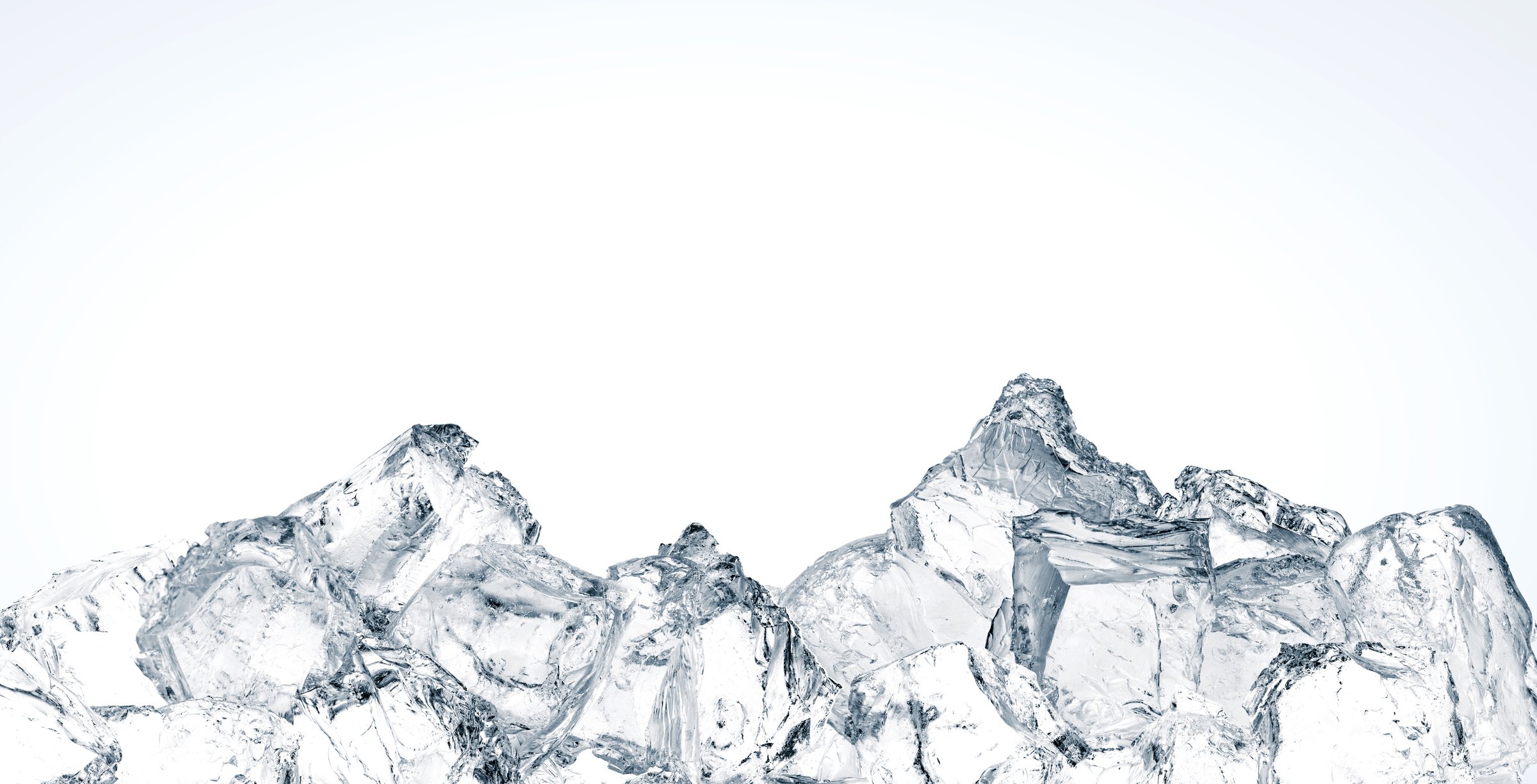 A heap of crushed random shape ice cubes, isolated on a white background.