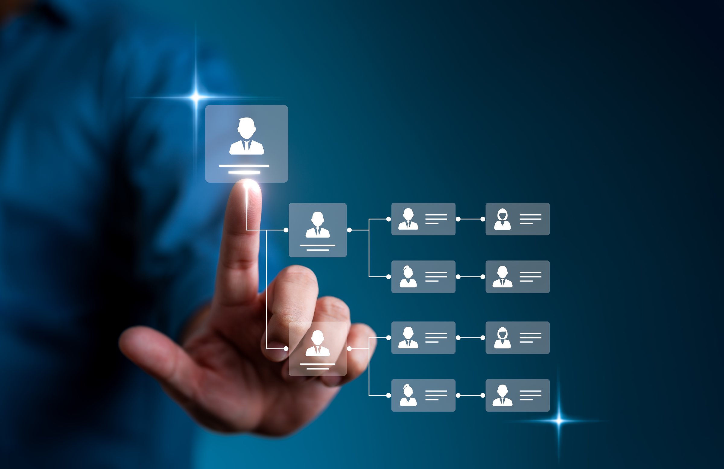 Businessman points to a virtual screen to arrange organization charts