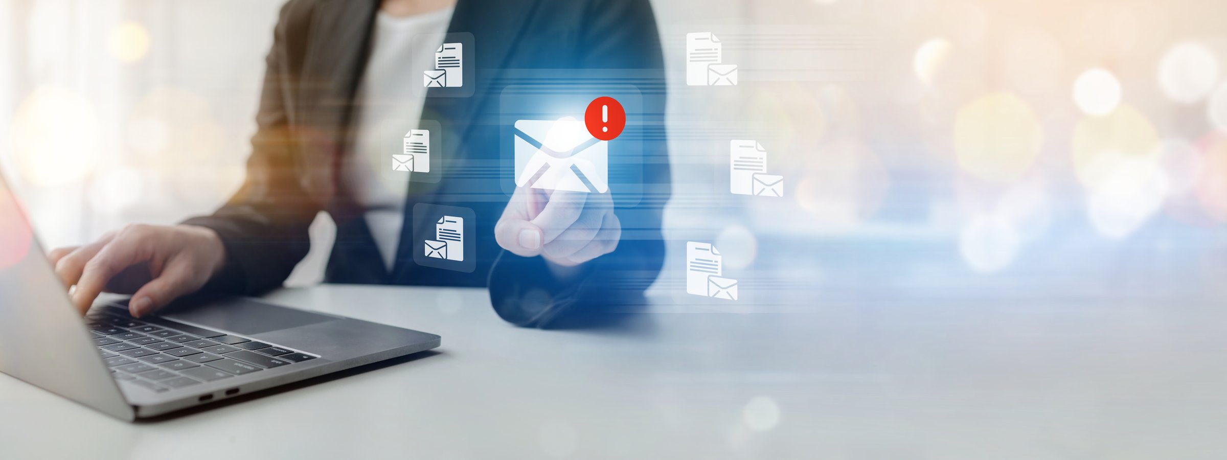 Concepts of using email in business, sending and replying to emails with customers, company email notifications and virus screening, official business communication.