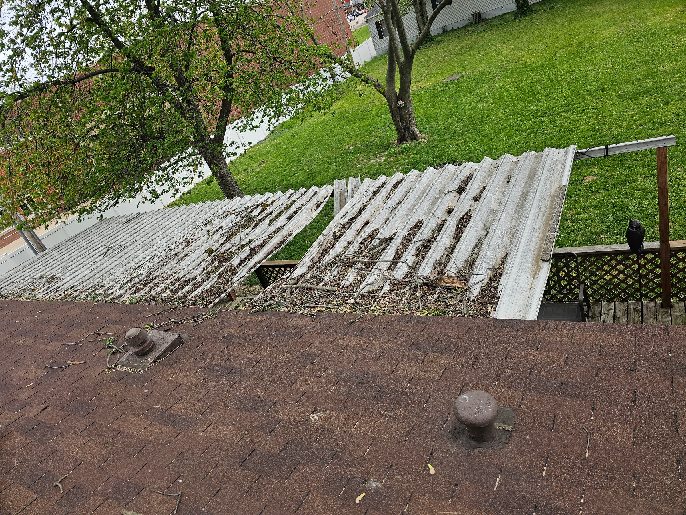 Storm damaged roof before repair in Festus, Missouri