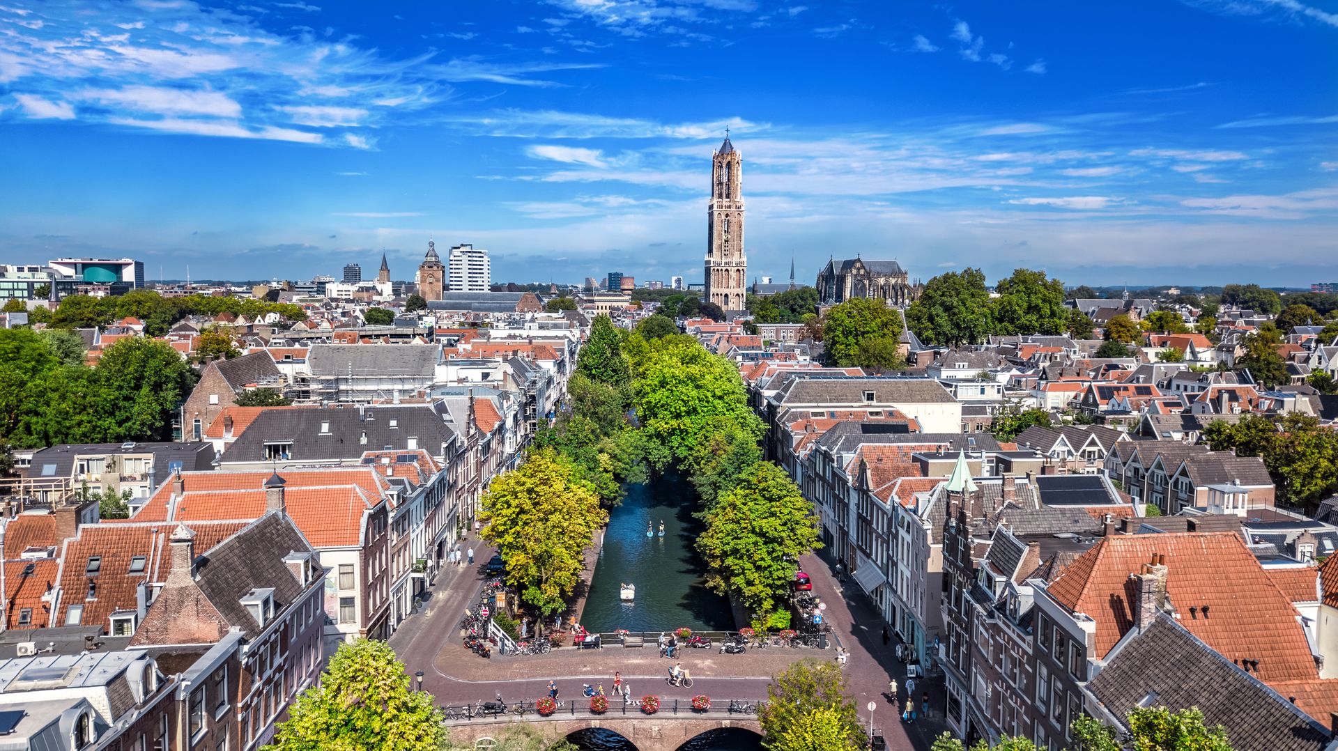 Utrecht town аerial drone view from above, typical Dutch city skyline, Utrecht cityscape with tower, canals and houses, Holland, the Netherlands