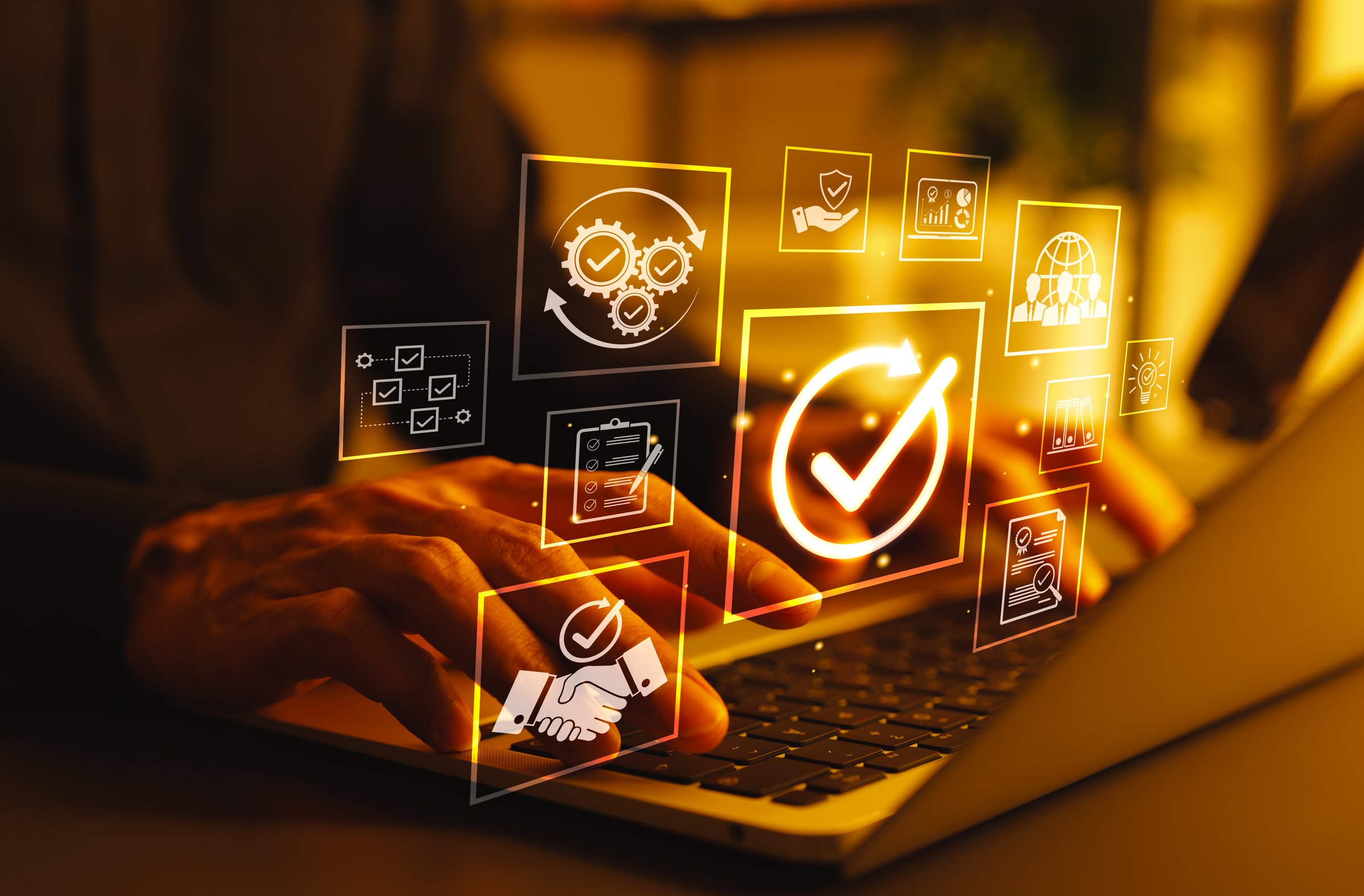 Business Quality Assurance and Compliance Concept. Person using laptop with icons represent quality assurance, compliance, process improvement, certification, success, effective operational standards,