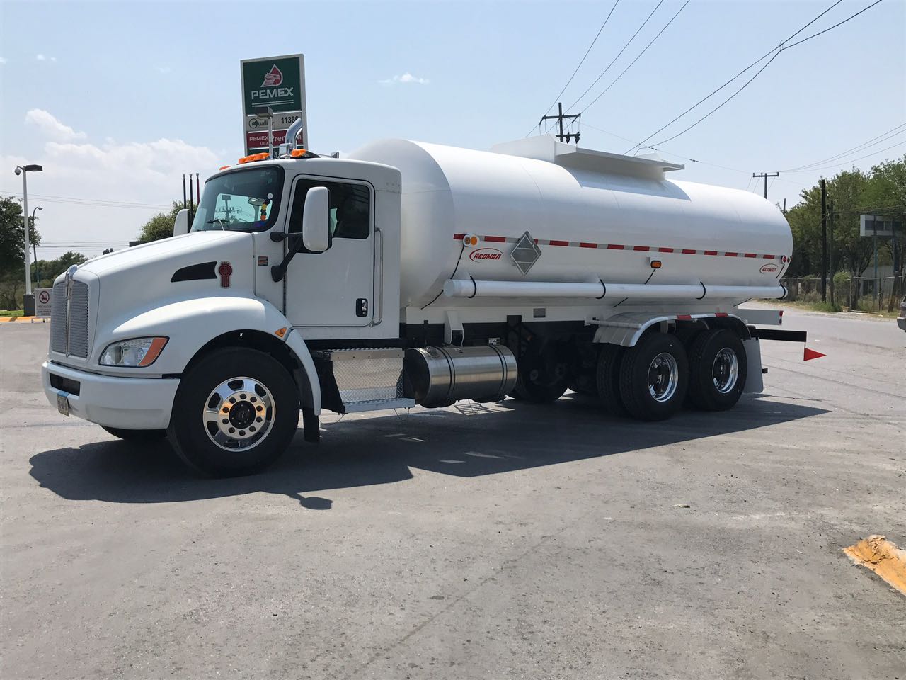 ISO tank container on chassis for intermodal liquid transport