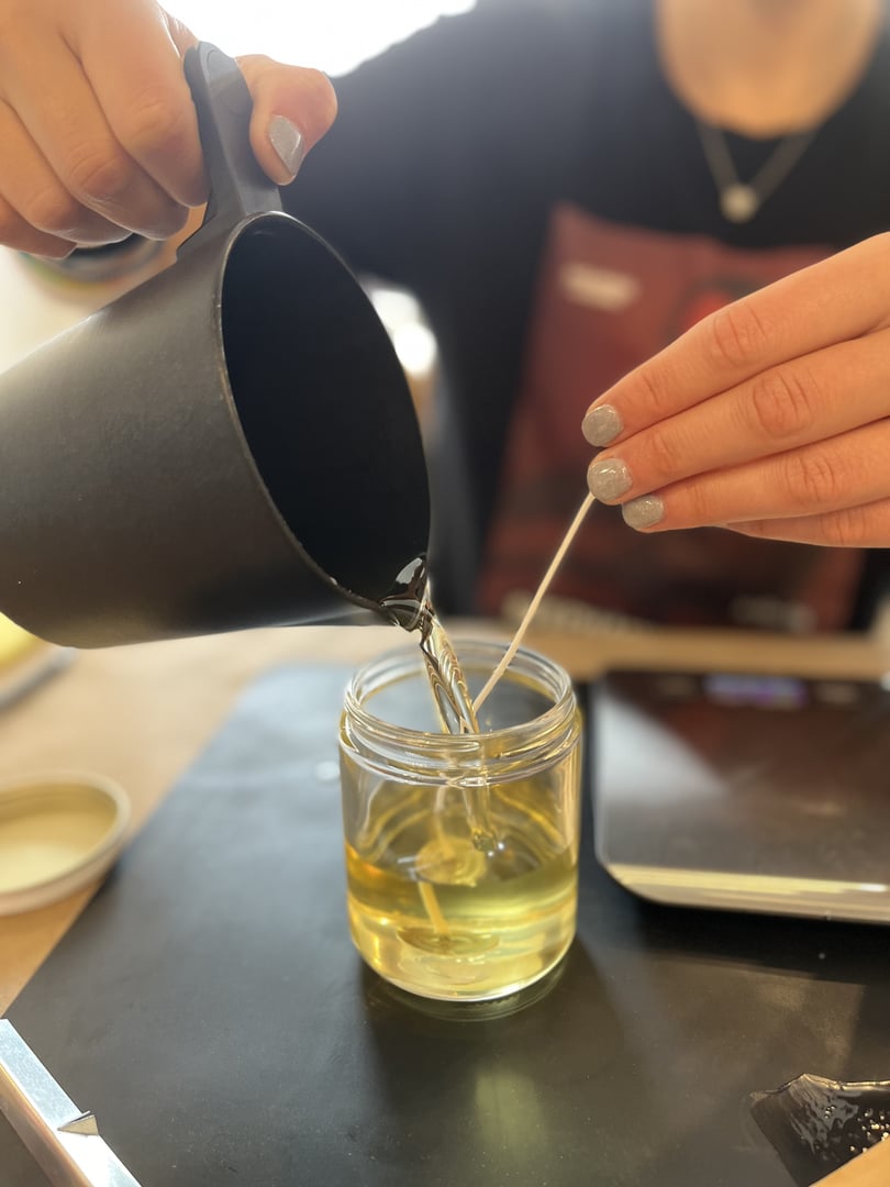 In Process Candle Making Closeup Hot Wax Pour