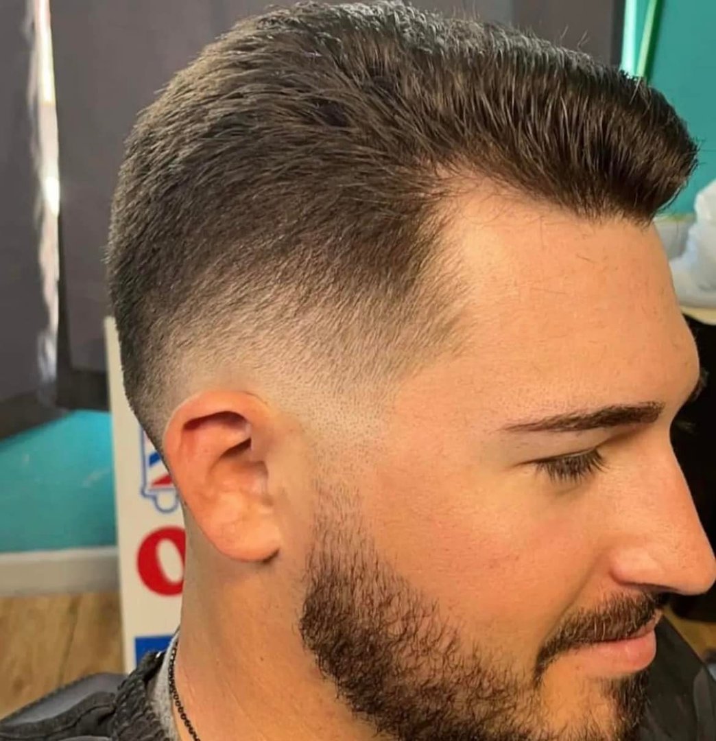 Austin Mitchell haircut