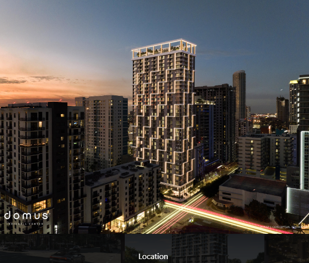 Night view of a modern high-rise building in a cityscape, with bright lights and a sunset sky, labeled 'domus' at the bottom.