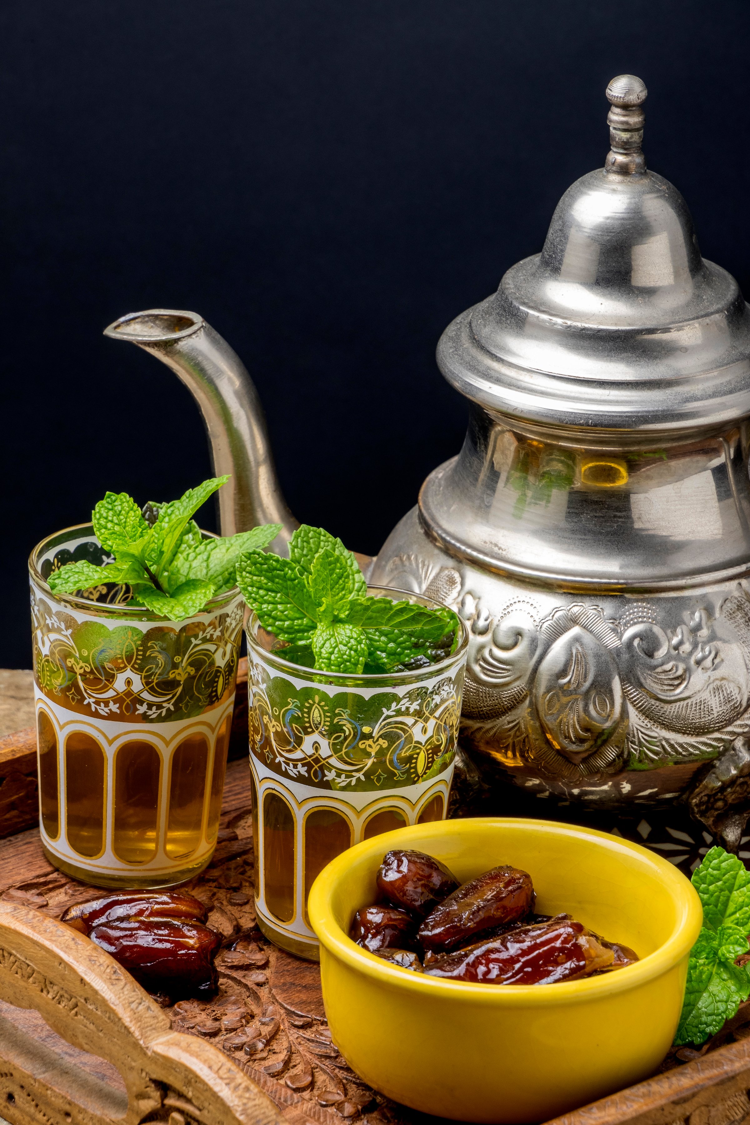 Tray with teapot of mint tea and dates
