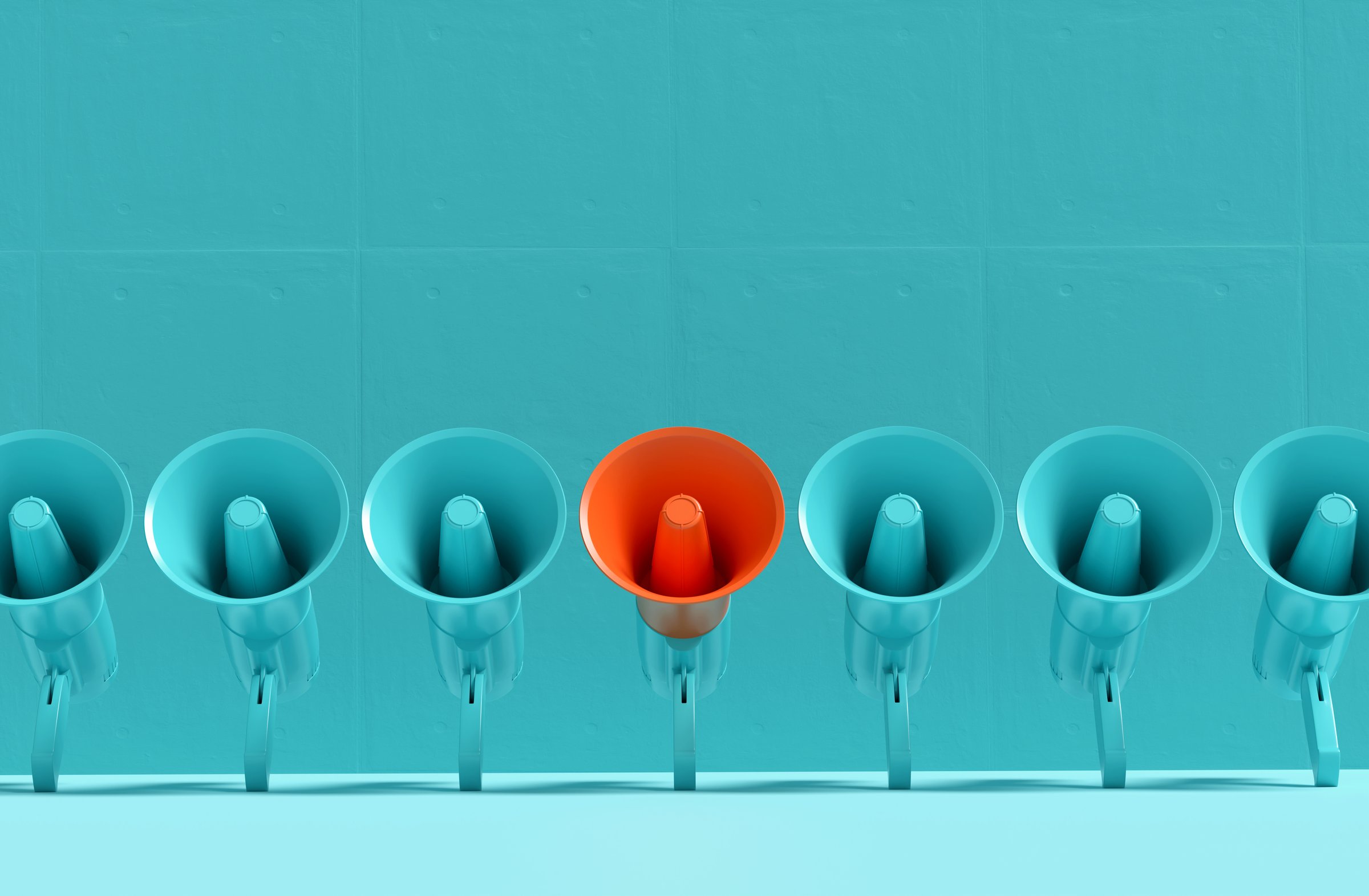 Important announcement, attention and different message concept. Blue megaphones in a row with one of them is in orange color on blue background. 3D render.